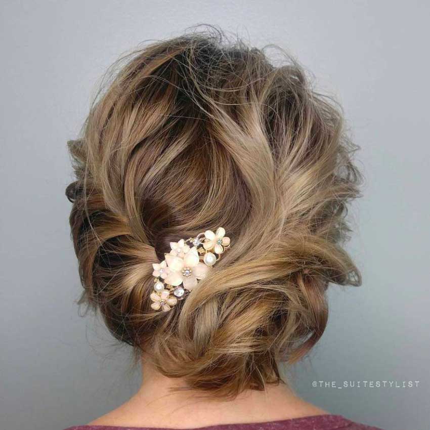 Acconciatura sposa capelli medi