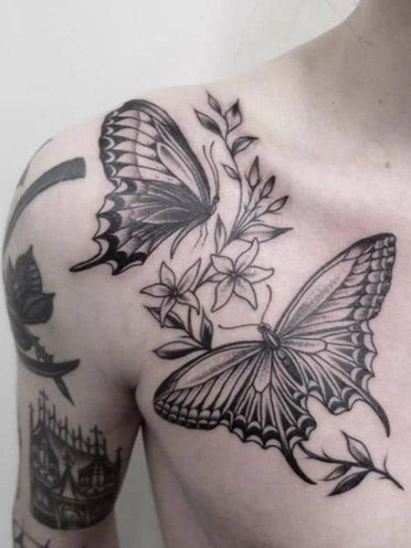 Tatuaggio con fiore e farfalla
