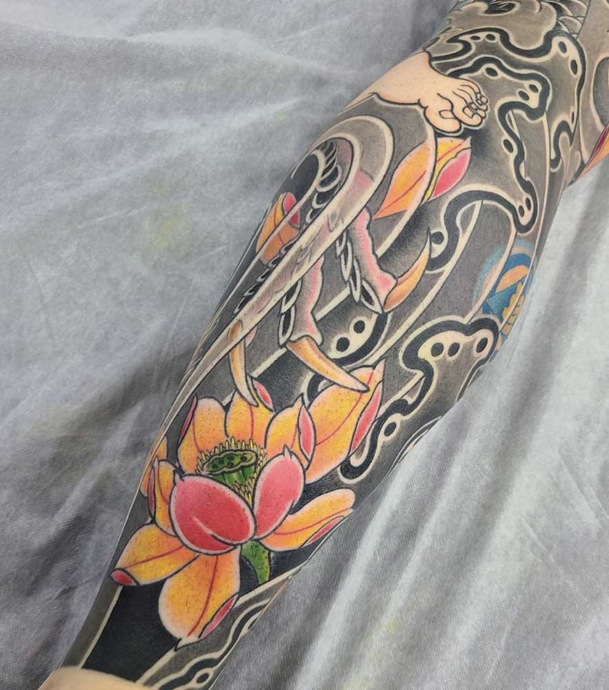 Tatuaggio con fiore di loto