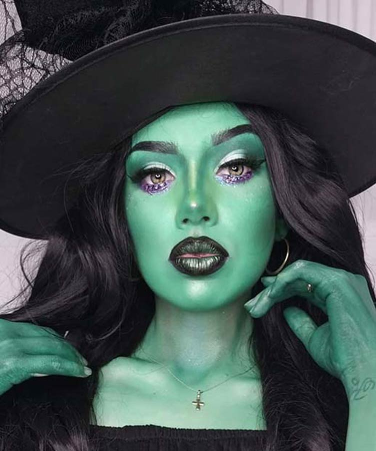 Trucco da strega verde e viola