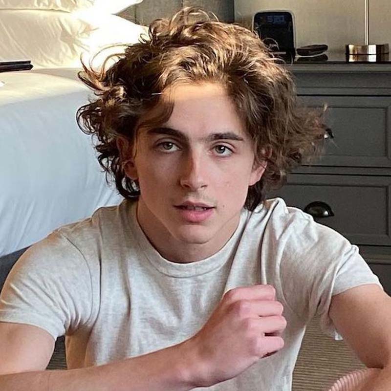le migliori acconciature per uomo con capelli mossi del 2022 1 Taglio capelli mossi shag