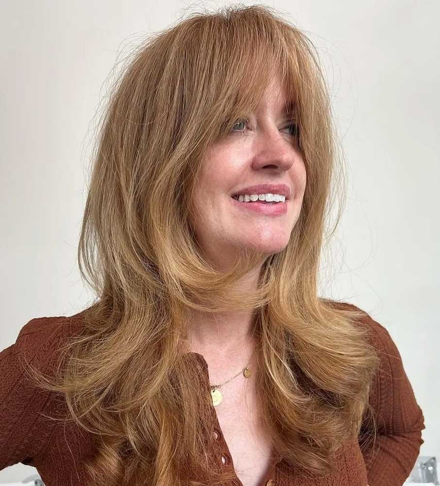 Capelli a strati con frangia
