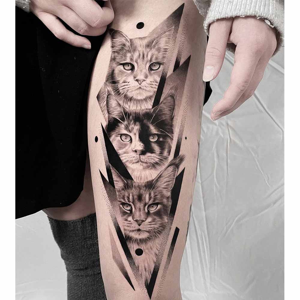 Tatuaggio gatti molto elaborato