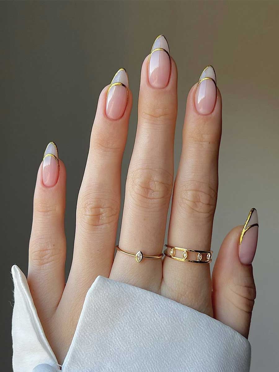 Doppia french manicure oro su base trasparente 
