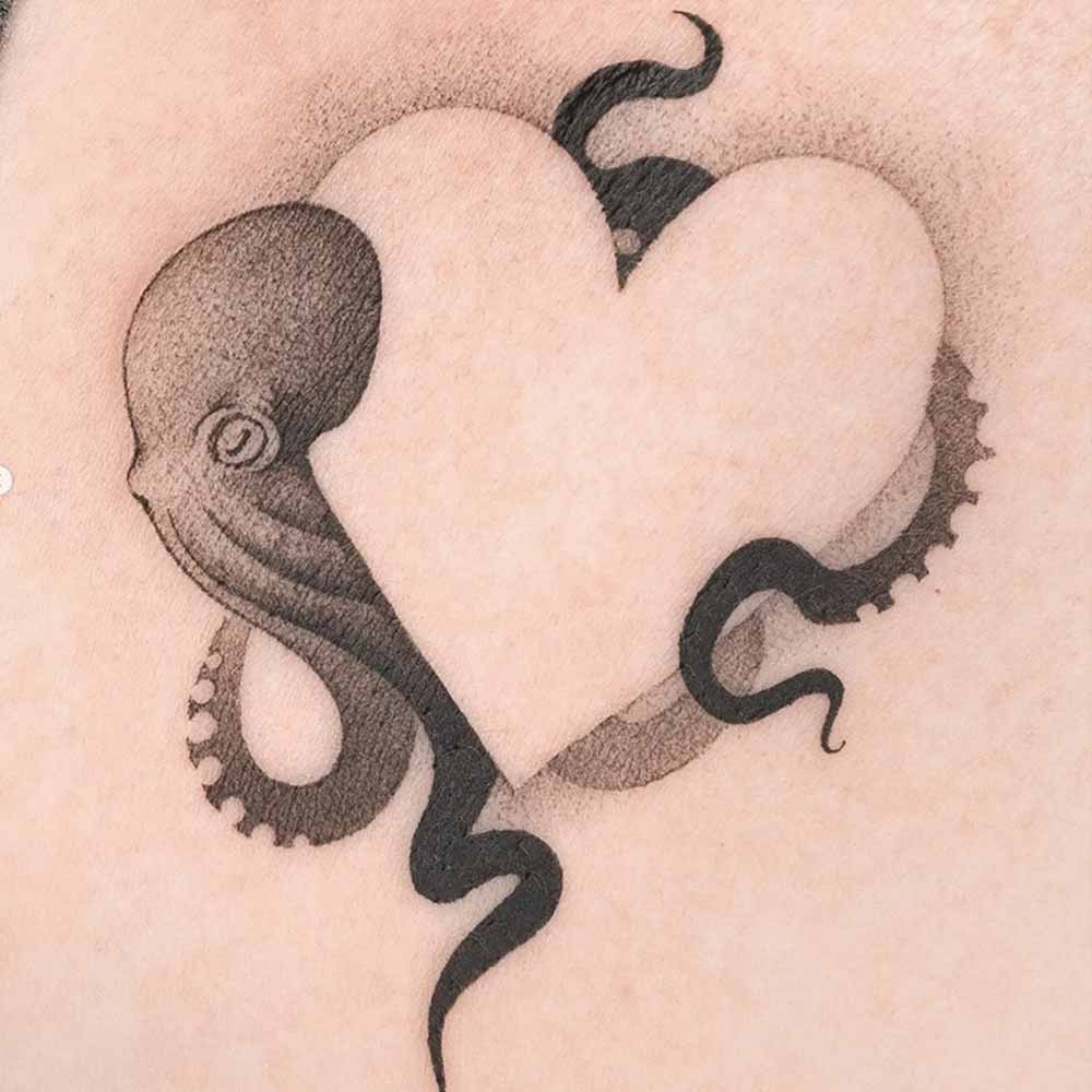 Tatuaggio cuore: 50 FOTO idee uniche e significati 5 tatuaggio cuore minimalista 2