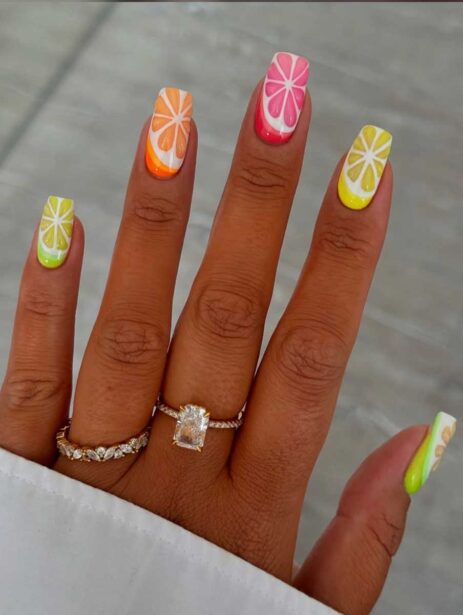 unghie fluo con agrumi